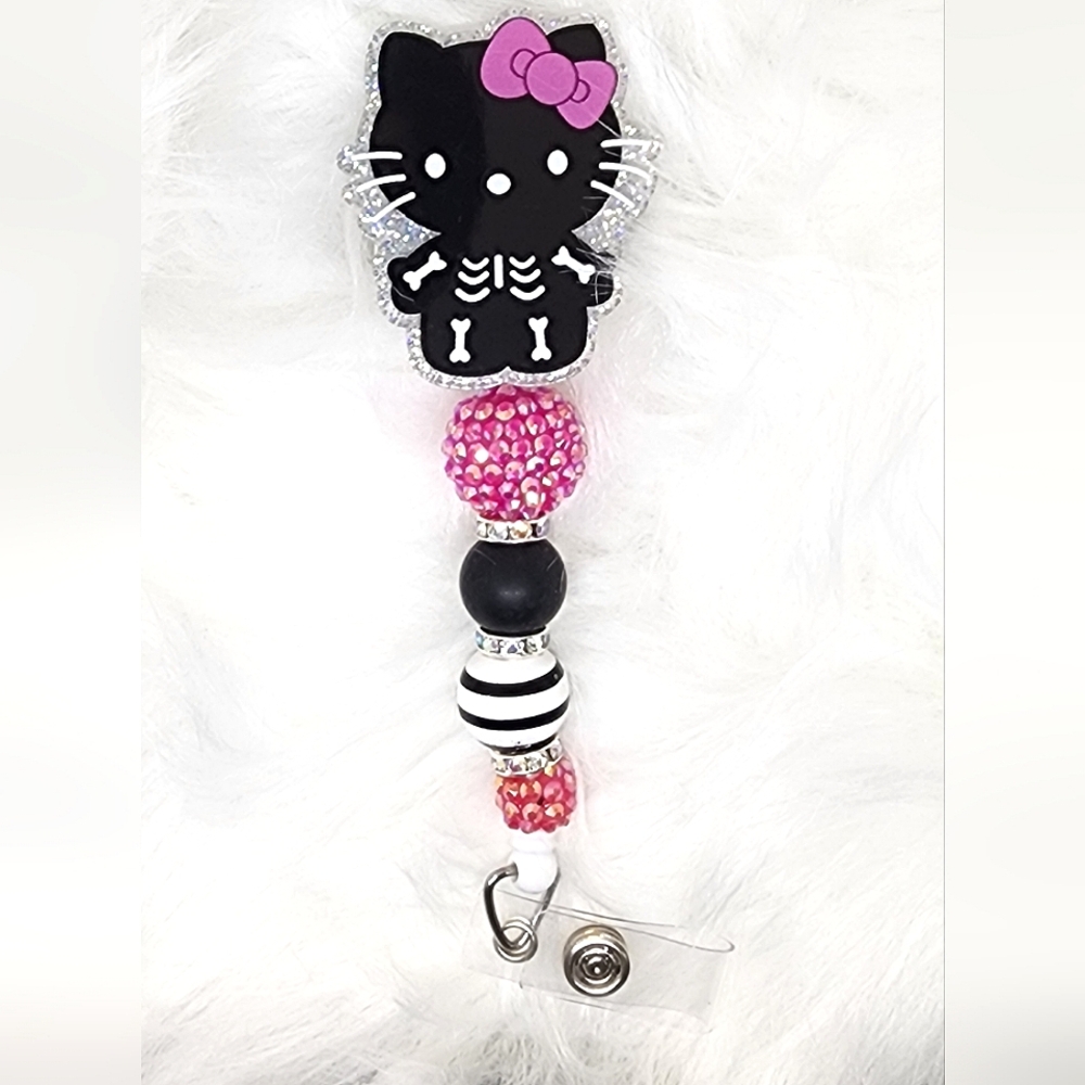 Skeleton Hello Kitty Pink and Black Badge Reel